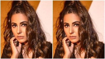 Hina Khan's voluminous tresses stole the show with an edgy twist. She partly tied her hair in a top knot and left half of it to fall freely from her back, adding mini braids on top for an extra modern touch. The hairstyle showcased her natural beauty and effortless style. (Instagram/@realhinakhan) Hina Khan's voluminous tresses stole the show with an edgy twist. She partly tied her hair in a top knot and left half of it to fall freely from her back, adding mini braids on top for an extra modern touch. The hairstyle showcased her natural beauty and effortless style. (Instagram/@realhinakhan)