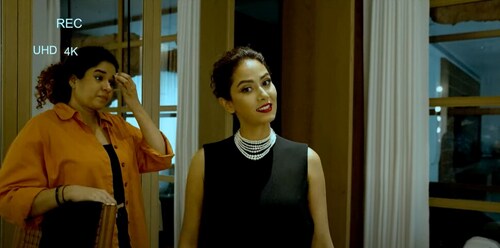 Mira Rajput inside the living room with glass and wooden doors. Mira Rajput inside the living room with glass and wooden doors.