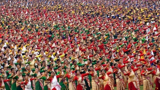 Around 11,000 Bihu dancers perform at Indira Gandhi Athletic Stadium, Sarusajai, in Guwahati. (ANI Photo) Around 11,000 Bihu dancers perform at Indira Gandhi Athletic Stadium, Sarusajai, in Guwahati. (ANI Photo)