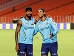 Gujarat Titans captain Hardik Pandya with team head coach Ashish Nehra