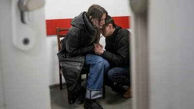 Russia-Ukraine war: Young mother collapses in husband's arms after toddler killed in Russian shell attack. (Twitter)