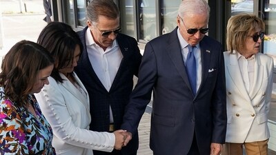 Joe Biden in tears after encounter with priest who performed his son's last rites. (Reuters)