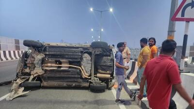 Gurugram, India-April 15, 2023: A speeding car of cow smugglers loaded with meet overturned at Gurugram-Sohna elevated road near Vatika chowk, in Gurugram, India, on Saturday, 15 April 2023. (Photo/HT)(Pic to go with Leena's story) Gurugram, India-April 15, 2023: A speeding car of cow smugglers loaded with meet overturned at Gurugram-Sohna elevated road near Vatika chowk, in Gurugram, India, on Saturday, 15 April 2023. (Photo/HT)(Pic to go with Leena's story)
