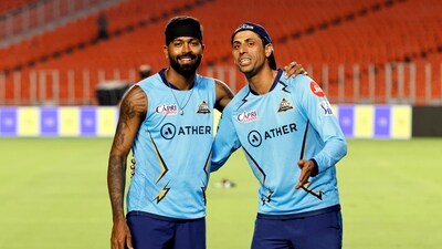 Gujarat Titans captain Hardik Pandya with team head coach Ashish Nehra (PTI) Gujarat Titans captain Hardik Pandya with team head coach Ashish Nehra (PTI)