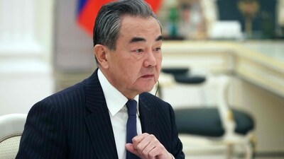 Wang Yi made the remarks at a meeting with German Foreign Minister Annalena Baerbock. (AFP) Wang Yi made the remarks at a meeting with German Foreign Minister Annalena Baerbock. (AFP)
