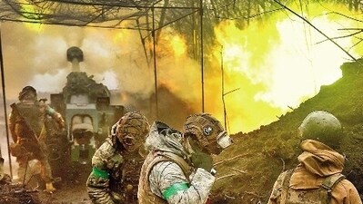 Ukrainian artillery fires towards the frontline during heavy fighting near Bakhmut on Friday. (REUTERS) Ukrainian artillery fires towards the frontline during heavy fighting near Bakhmut on Friday. (REUTERS)