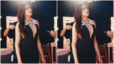 Styled by fashion stylist Priyanka Kapadia Badani, Janhvi wore her tresses open in wavy curls with a middle part.&nbsp; (Instagram/@janhvikapoor)