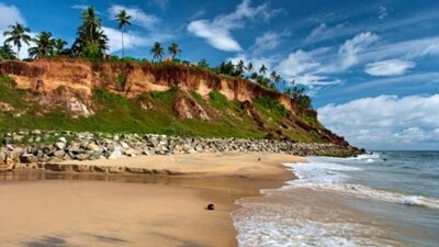 Beaches of Varkala: Varkala's beaches are famous for their rugged cliffs and pristine waters. You can enjoy a refreshing dip in the sea or try surfing and parasailing. The place also has several restaurants and cafes, serving delicious seafood (Unsplash) Beaches of Varkala: Varkala's beaches are famous for their rugged cliffs and pristine waters. You can enjoy a refreshing dip in the sea or try surfing and parasailing. The place also has several restaurants and cafes, serving delicious seafood (Unsplash)