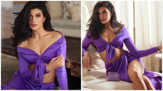 Jacqueline Fernandez once again leaves the internet spellbound with her latest photos in a purple set which comes with an off-shoulder crop top and a slit skirt.&nbsp;(Instagram/@jacqueline143)