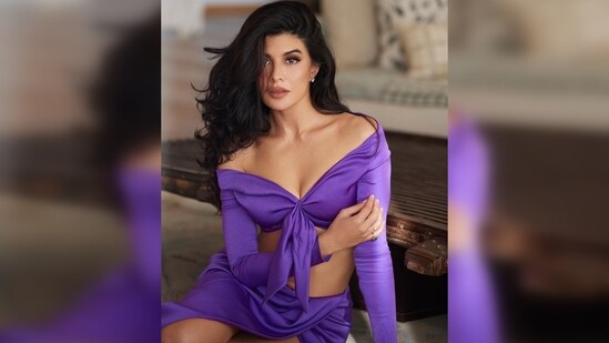 Jacqueline Fernandez's outfit features a tie-up plunging neckline crop top and a matching skirt with a slit.(Instagram/@jacqueline143)