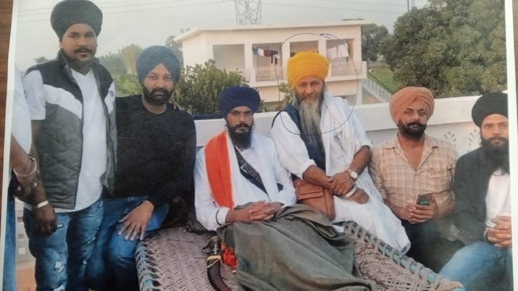 Joga Singh (yellow turban) with radical preacher Amritpal Singh (File) (ANI)