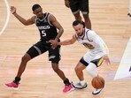  Golden State Warriors guard Stephen Curry (30) turns the ball over while dribbling next to Sacramento Kings guard De'Aaron Fox (5) in the second quarter during game one of the 2023 NBA playoffs at the Golden 1 Center. Mandatory Credit: Cary Edmondson-USA TODAY Sports