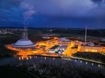 Lights illuminate the Neckarwestheim 2 Nuclear Power Station, operated by EnBW Energie Baden-Wuerttemberg AG, in Neckarwestheim, Germany, before being shut on April 15. Lights illuminate the Neckarwestheim 2 Nuclear Power Station, operated by EnBW Energie Baden-Wuerttemberg AG, in Neckarwestheim, Germany, before being shut on April 15.