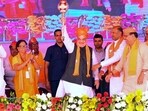 **EDS: TWITTER IMAGE VIA @AmitShah** Bharatpur: Union Home Minister Amit Shah with former Rajasthan chief minister Vasundhara Raje during 'Booth President Sankalp Mahasammelan', in Bharatpur, Saturday, April 15, 2023. (PTI Photo)(PTI04_15_2023_000308B)(PTI)