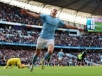 Erling Braut Haaland celebrates a goal for Manchester City.