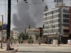 Smoke is seen rising from a neighborhood in Khartoum, Sudan, Saturday, April 15. 