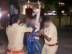 Policemen attempt to apprehend an assailant who opened fire at Gangster-turned-politician Atiq Ahmed and his brother Ashraf Ahmed while they were being taken for a medical checkup, in Prayagraj, Saturday. Policemen attempt to apprehend an assailant who opened fire at Gangster-turned-politician Atiq Ahmed and his brother Ashraf Ahmed while they were being taken for a medical checkup, in Prayagraj, Saturday.