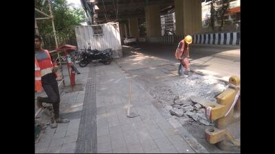 According to civic officials, the standard footpath width is 1.5 to 1.8 metres on both sides of the road. (HT PHOTO) According to civic officials, the standard footpath width is 1.5 to 1.8 metres on both sides of the road. (HT PHOTO)