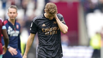 Arsenal's Martin Odegaard reacts after the English Premier League soccer match against West Ham at the London Stadium, London, Sunday April 16, 2023. (Adam Davy/PA via AP) (AP) Arsenal's Martin Odegaard reacts after the English Premier League soccer match against West Ham at the London Stadium, London, Sunday April 16, 2023. (Adam Davy/PA via AP) (AP)