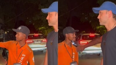 Hrithik Roshan tried to pose with a food delivery person but his security pushed him away. Hrithik Roshan tried to pose with a food delivery person but his security pushed him away.