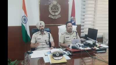 Inspector general of police (IGP), Ambala range, Sibash Kabiraj (right) with Ambala SP Jashandeep Singh Randhawa on Sunday. “Under the Operation Prahar, raids were carried out on wanted gangsters or their associates and relatives. Most of the recoveries were made in Yamunanagar where apart from arms and ammunition, ₹40 lakh and 42 mobile phones were seized,” he told the reporters. (HT Photo) Inspector general of police (IGP), Ambala range, Sibash Kabiraj (right) with Ambala SP Jashandeep Singh Randhawa on Sunday. “Under the Operation Prahar, raids were carried out on wanted gangsters or their associates and relatives. Most of the recoveries were made in Yamunanagar where apart from arms and ammunition, ₹40 lakh and 42 mobile phones were seized,” he told the reporters. (HT Photo)