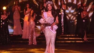 Shreya wore a beige sequinned gown featuring a plunging neckline, shimmering embellishments, a front thigh slit, and a floor-grazing hem for the finale. She completed the outfit with high heels, dangling earrings and striking makeup. (Instagram) Shreya wore a beige sequinned gown featuring a plunging neckline, shimmering embellishments, a front thigh slit, and a floor-grazing hem for the finale. She completed the outfit with high heels, dangling earrings and striking makeup. (Instagram)