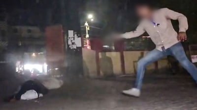 A man opens fire at gangster-turned-politician Atiq Ahmad and his brother Ashraf Ahmad as they are being taken for a medical checkup in Prayagraj on Saturday, (PTI) A man opens fire at gangster-turned-politician Atiq Ahmad and his brother Ashraf Ahmad as they are being taken for a medical checkup in Prayagraj on Saturday, (PTI)