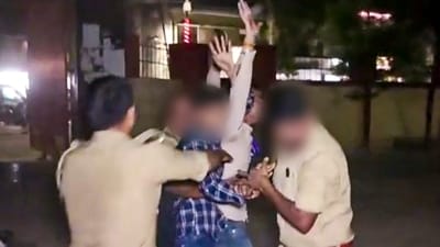 Policemen attempt to apprehend an assailant who opened fire at gangster-turned-politician Atiq Ahmad and his brother Ashraf Ahmad in Prayagraj on Saturday, (PTI) Policemen attempt to apprehend an assailant who opened fire at gangster-turned-politician Atiq Ahmad and his brother Ashraf Ahmad in Prayagraj on Saturday, (PTI)
