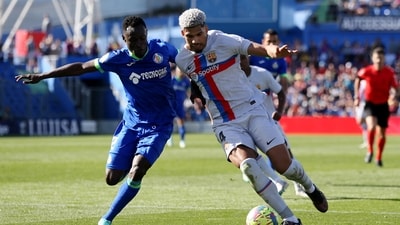 Getafe's Djene in action with FC Barcelona's Ronald Araujo (REUTERS)