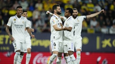 Real Madrid's Nacho, centre, celebrates with teammates after scoring the opening goal during the Spanish La Liga soccer match between Cadiz CF and Real Madrid at the Nuevo Mirandilla stadium in Cadiz, Spain, Saturday, April 15, 2023. (AP Photo/Jose Breton) (AP)