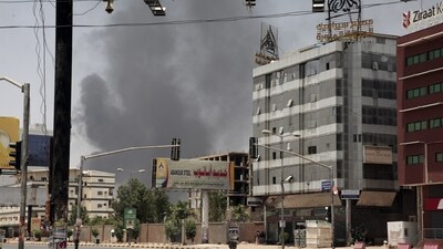 Smoke is seen rising from a neighborhood in Khartoum, Sudan, Saturday, April 15. (AP) Smoke is seen rising from a neighborhood in Khartoum, Sudan, Saturday, April 15. (AP)
