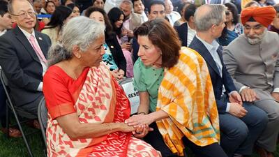 Union finance minister Nirmala Sitharaman interacts with United States secretary of commerce Gina Raimondo during the community event, in Washington DC. (ANI)