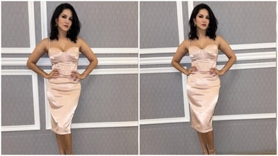 Sunny Leone is an absolute fashionista. The actor keeps slaying fashion goals like a pro with snippets from her fashion diaries on her Instagram profile on a regular basis. From acing casual ensembles to festive attires to being the boss babe in a formal power suit, Sunny can do it all. The actor, a day back, shared a slew of pictures of herself looking gorgeous in a satin short dress. (Instagram/@sunnyleone) Sunny Leone is an absolute fashionista. The actor keeps slaying fashion goals like a pro with snippets from her fashion diaries on her Instagram profile on a regular basis. From acing casual ensembles to festive attires to being the boss babe in a formal power suit, Sunny can do it all. The actor, a day back, shared a slew of pictures of herself looking gorgeous in a satin short dress. (Instagram/@sunnyleone)