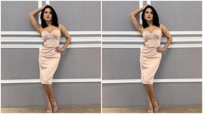 Sunny looked gorgeous in the pastel short slip dress featuring corset details and bodycon patterns. In nude stilettos, she accessorised her look. (Instagram/@sunnyleone) Sunny looked gorgeous in the pastel short slip dress featuring corset details and bodycon patterns. In nude stilettos, she accessorised her look. (Instagram/@sunnyleone)