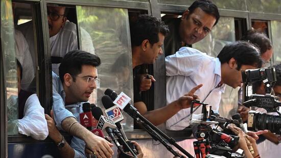 Police detain AAP leaders during a protest near the CBI office in New Delhi on Sunday. (Vipin Kumar/HT Photo)