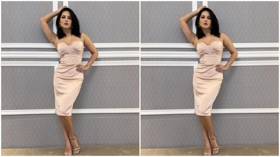 Sunny looked gorgeous in the pastel short slip dress featuring corset details and bodycon patterns. In nude stilettos, she accessorised her look.&nbsp;(Instagram/@sunnyleone)
