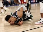 Giannis Antetokounmpo #34 of the Milwaukee Bucks is injured during Game One of the Eastern Conference First Round Playoffs against the Miami Heat at Fiserv Forum on April 16, 2023 in Milwaukee, Wisconsin. Giannis Antetokounmpo #34 of the Milwaukee Bucks is injured during Game One of the Eastern Conference First Round Playoffs against the Miami Heat at Fiserv Forum on April 16, 2023 in Milwaukee, Wisconsin.