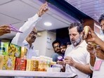 Congress leader Rahul Gandhi at a Nandini milk shop during his visit to Karnataka on Sunday, (PTI)
