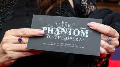 A woman displays a ticket on the carpet before the final show of ‘The Phantom of the Opera.’ The 41 Broadway theatres near Times Square that make up New York's cultural and touristic heart average between 200,000 and 300,000 spectators every week, bringing in more than $30 million in weekly revenue, reported AFP. (Caitlin Ochs / Reuters) A woman displays a ticket on the carpet before the final show of ‘The Phantom of the Opera.’ The 41 Broadway theatres near Times Square that make up New York's cultural and touristic heart average between 200,000 and 300,000 spectators every week, bringing in more than $30 million in weekly revenue, reported AFP. (Caitlin Ochs / Reuters)