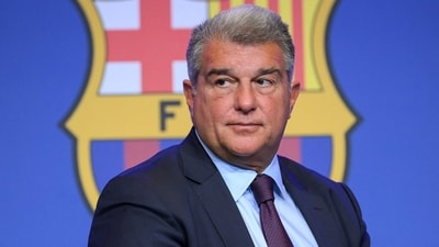 Barcelona's President Joan Laporta presents documents as he addresses a press conference at the Camp Nou stadium in Barcelona. (AFP) Barcelona's President Joan Laporta presents documents as he addresses a press conference at the Camp Nou stadium in Barcelona. (AFP)
