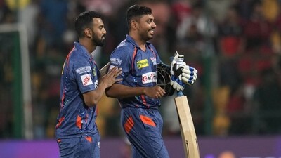 Lucknow Super Giants' captain KL Rahul celebrates with teammate Avesh Khan after their win against Royal Challengers Bangalore (AP) Lucknow Super Giants' captain KL Rahul celebrates with teammate Avesh Khan after their win against Royal Challengers Bangalore (AP)
