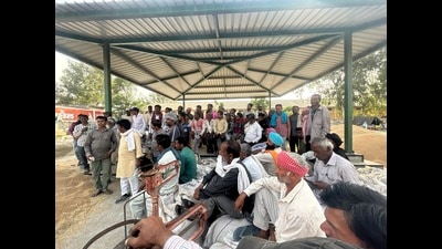 Mandi workers (labourers) during a strike in Sangrur on Monday. (HT Photo)