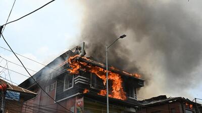 Officials said the fire erupted from a restaurant at the Dargah Hazratbal, Srinagar. (Waseem Andrabi/HT) Officials said the fire erupted from a restaurant at the Dargah Hazratbal, Srinagar. (Waseem Andrabi/HT)