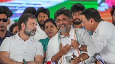Congress leader Rahul Gandhi with KPCC President DK Shivakumar and AICC general secretary Randeep Surjewala in Kolar on Sunday, April 16, 2023. (PTI Photo/Shailendra Bhojak)