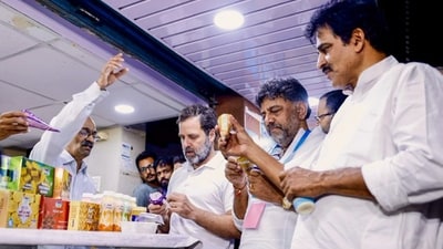 Congress leader Rahul Gandhi at a Nandini milk shop during his visit to Karnataka on Sunday, (PTI) Congress leader Rahul Gandhi at a Nandini milk shop during his visit to Karnataka on Sunday, (PTI)