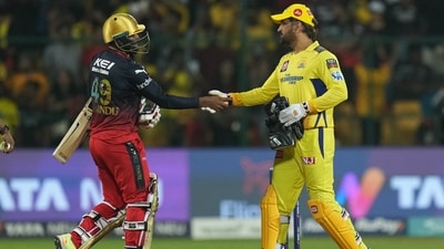 Chennai Super Kings captain MS Dhoni greets Royal Challengers Bangalore batter Wanindu Hasaranga at the end of the IPL 2023 match between the two sides. (PTI) Chennai Super Kings captain MS Dhoni greets Royal Challengers Bangalore batter Wanindu Hasaranga at the end of the IPL 2023 match between the two sides. (PTI)