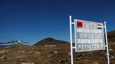 A signboard is seen from the Indian side of the Indo-China border at Bumla, in the northeastern Indian state of Arunachal Pradesh. (REUTERS) A signboard is seen from the Indian side of the Indo-China border at Bumla, in the northeastern Indian state of Arunachal Pradesh. (REUTERS)