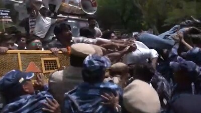BJP workers protest against Arvind Kejriwal over excise policy case. (ANI)