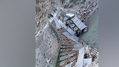 An iron bridge on the Dhauliganga river, connecting Niti Valley in Chamoli district snapped suddenly (ANI)