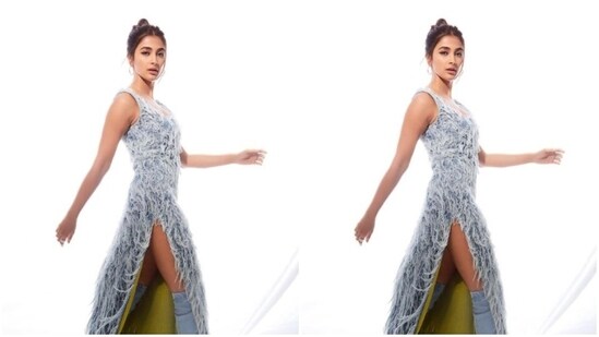Pooja, for the promotions, picked a pastel blue feather gown as she looked every bit gorgeous in the attire.&nbsp;(Instagram/@hegdepooja)